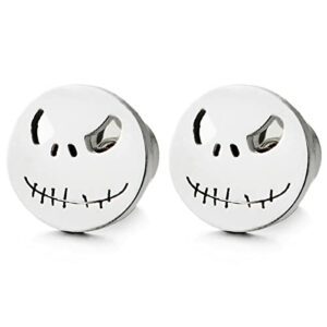 Pendientes de acero inoxidable con diseño de cara sonriente y detalles oscuros.