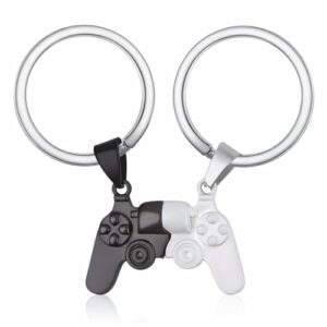 Llavero en forma de gamepad dividida en colores negro y blanco.