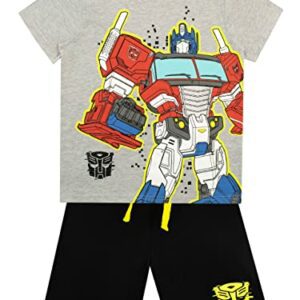 Conjunto infantil Transformers de camiseta gris con dibujo de Optimus Prime y pantalones cortos negros, talla 11-12 años.