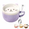 Taza de cerámica morada con diseño de gato kawaii, tapa y cuchara.