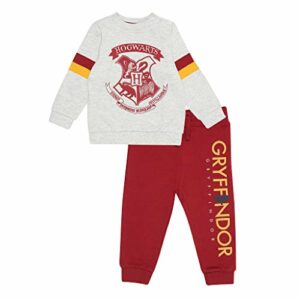 Conjunto infantil de sudadera gris y joggers rojos de Harry Potter, con el logo de Hogwarts y "Gryffindor".