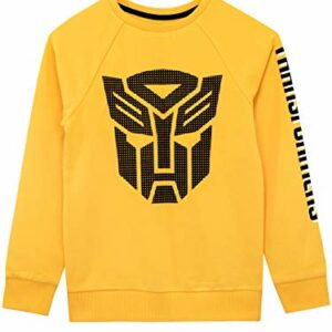 Sudadera amarilla infantil con el logotipo de Autobots en el frente y "Transformers" en la manga.