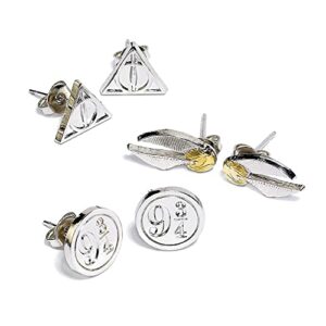 Pendientes plateados de Harry Potter con símbolos de la saga, como el andén 9¾ y la snitch dorada.