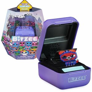 Juguete interactivo Bitzee con mascotas virtuales en caja violeta.